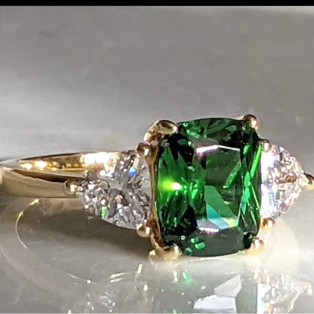 Gold Plated Ring with Green Emerald-Cut Center Stone and Side Diamonds